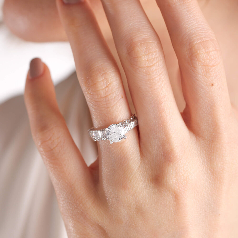 White Solid Gold Solitaire Ring Baguette Infinity Design