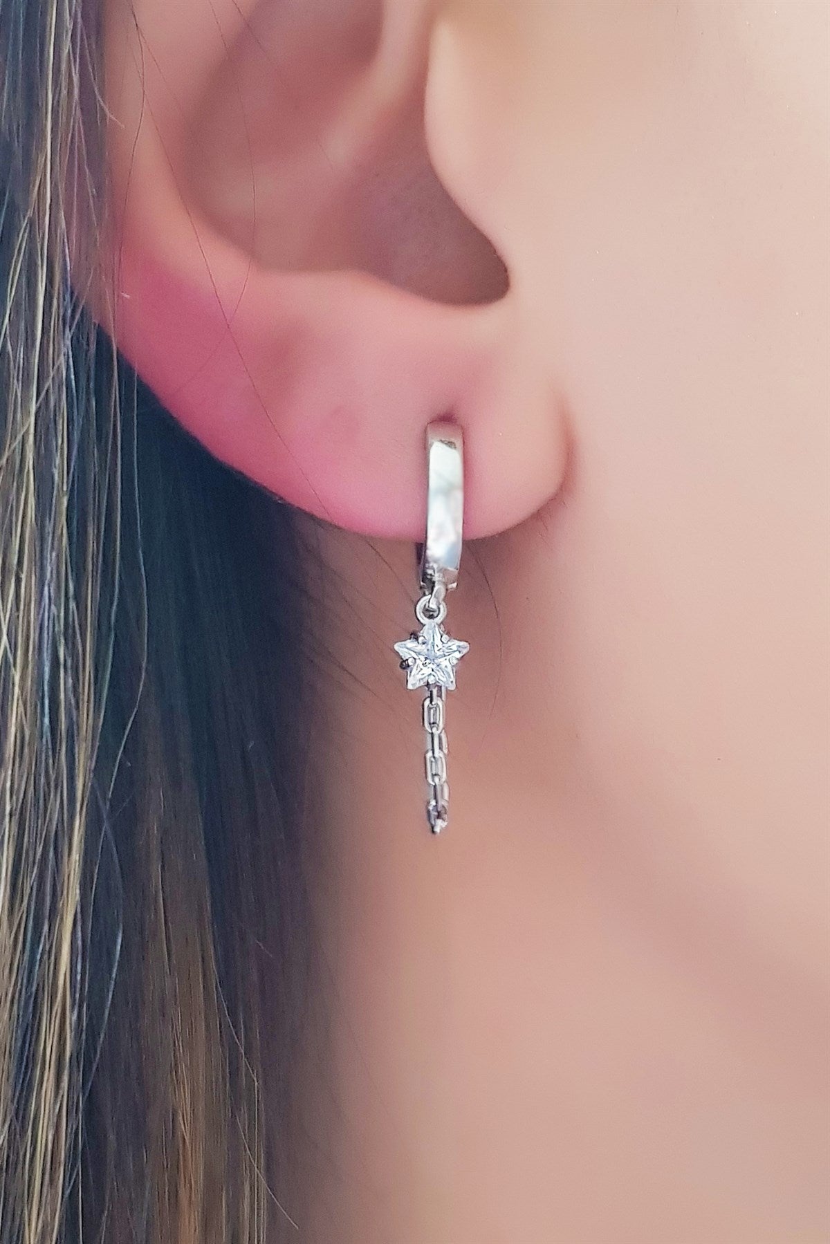 Pendientes de estrella tambaleante de plata