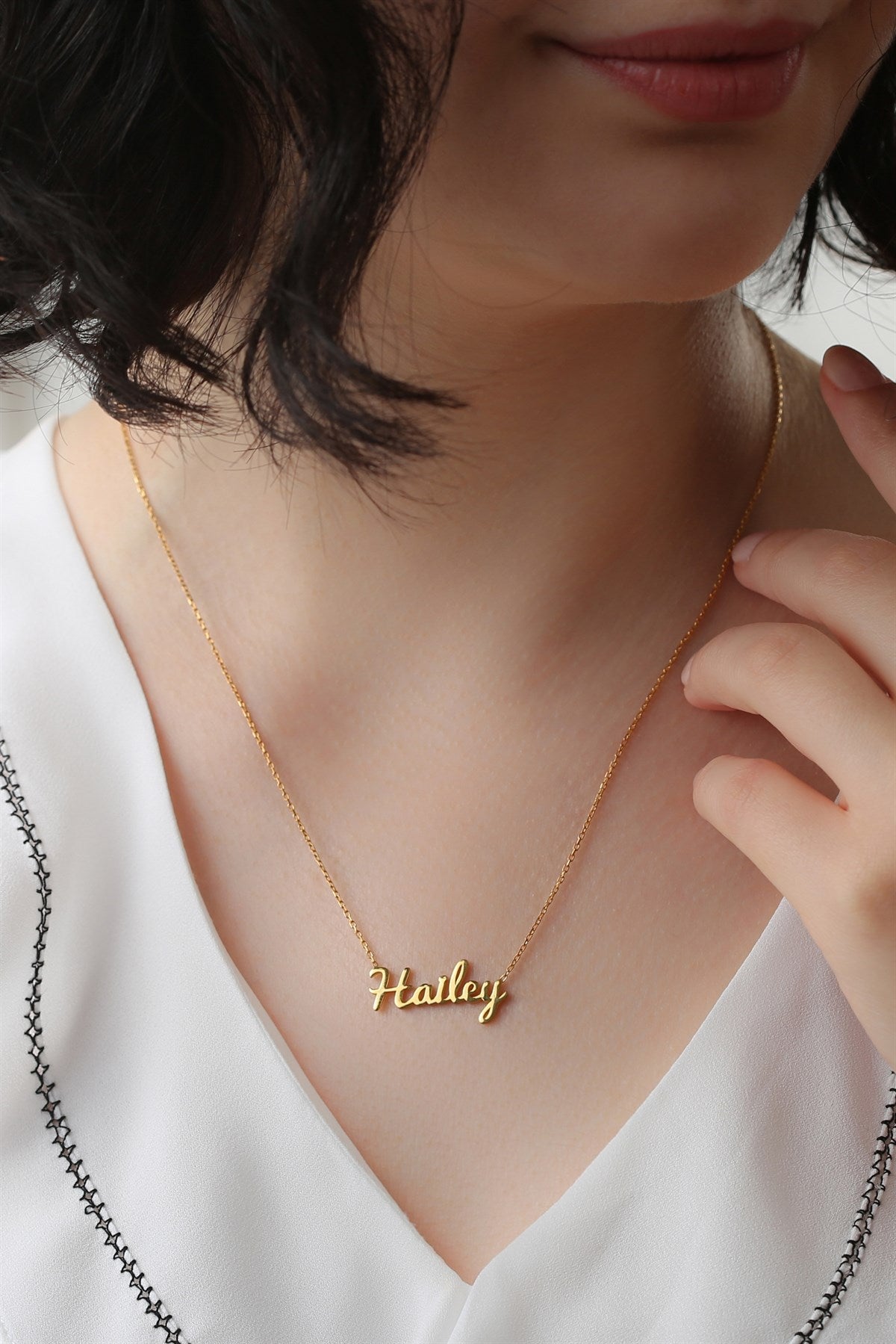 Collar de plata con nombre escrito a mano