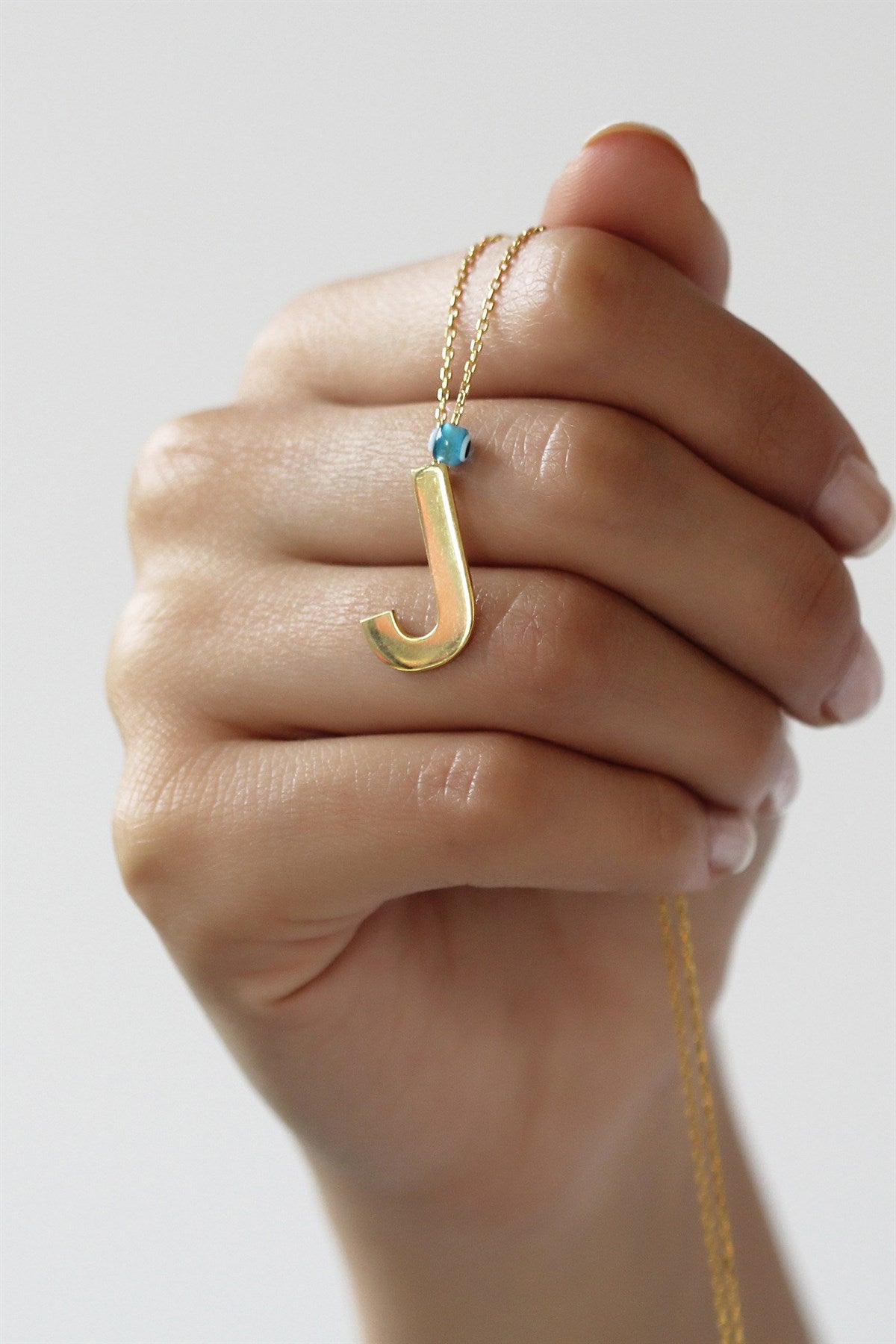 Collier initial en argent mauvais œil