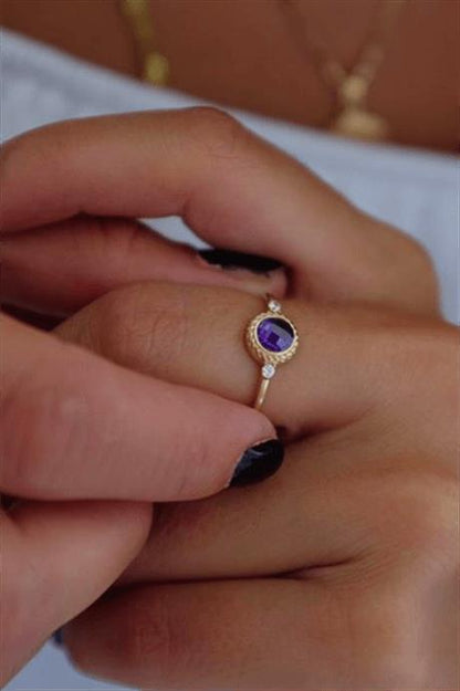 Bague en or massif avec six pierres précieuses violettes | 14K (585) | 1,54 g