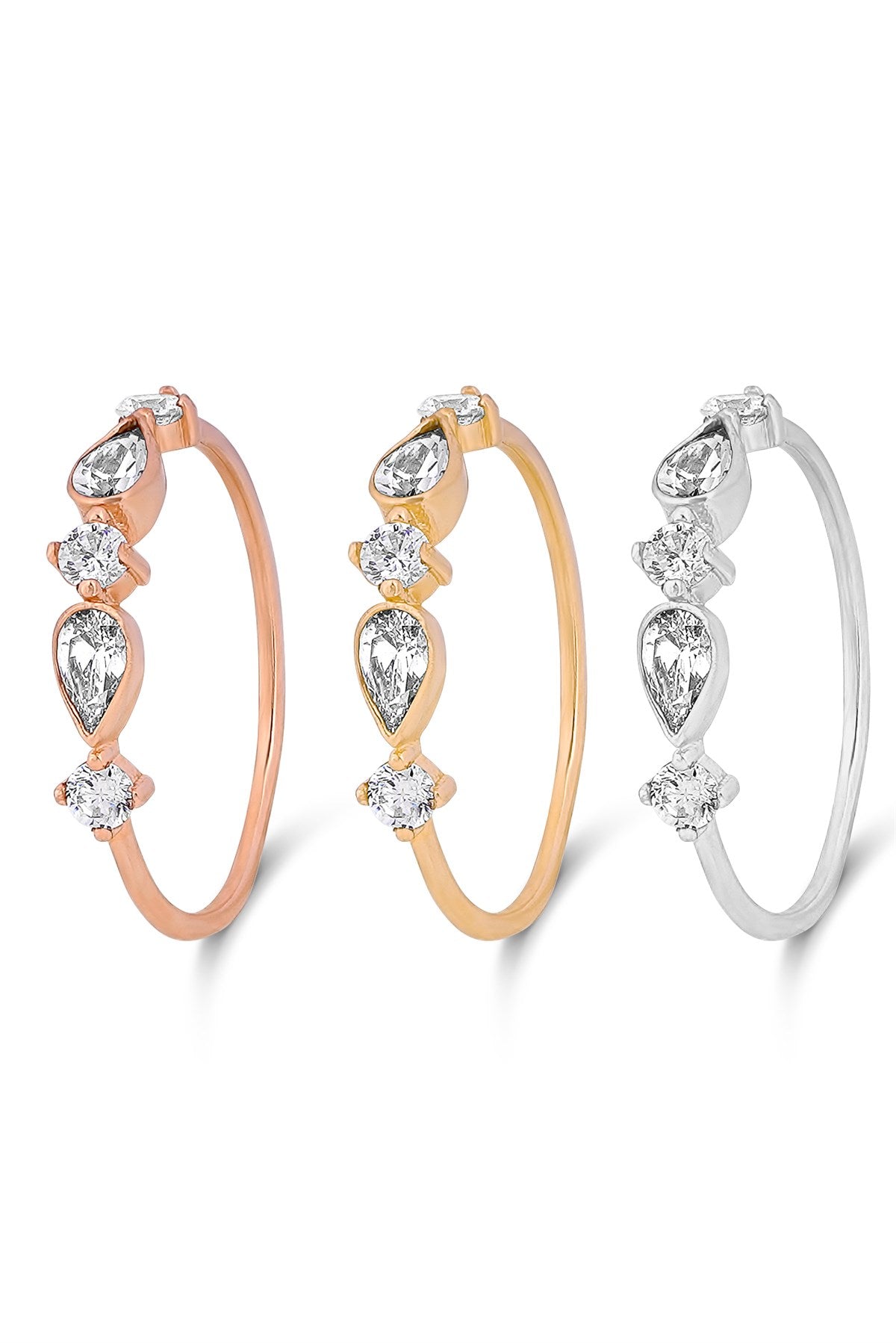 Anillo con diseño de piedras preciosas en forma de gota de oro macizo