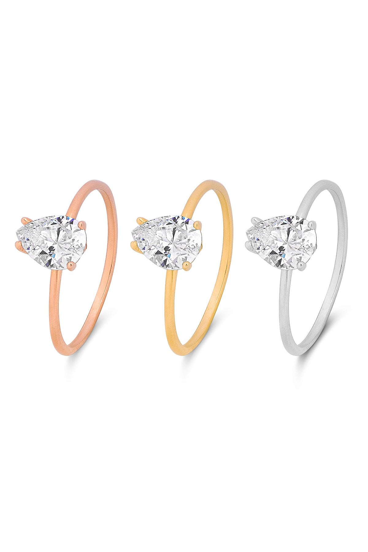 Bague en or massif avec pierres précieuses en forme de goutte