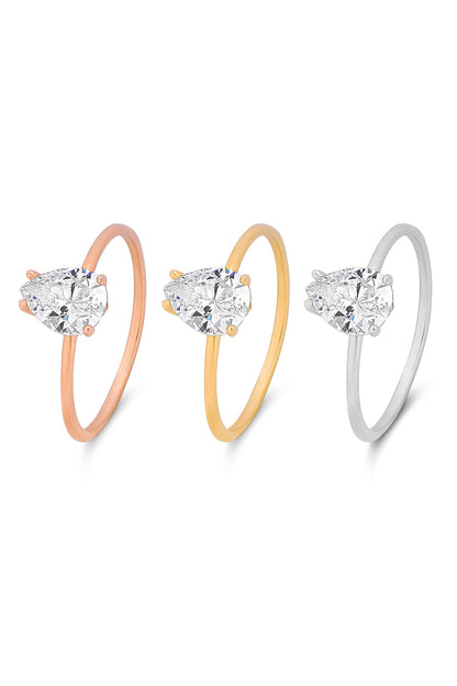 Bague en or massif avec pierres précieuses en forme de goutte