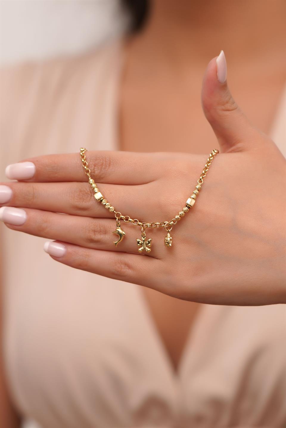 Pulsera con dijes de cuentas Dorica de oro macizo