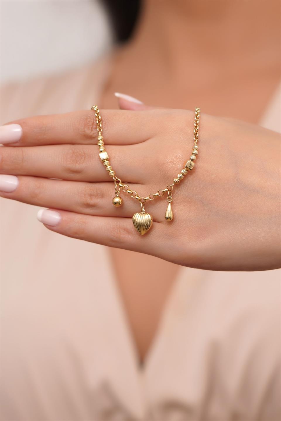 Pulsera con dijes de cuentas Dorica de oro macizo