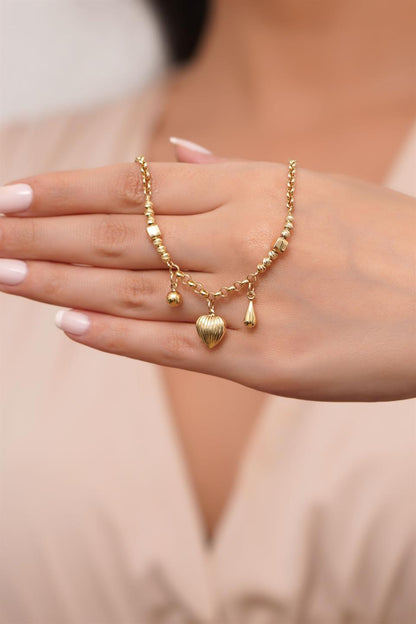 Pulsera con dijes de cuentas Dorica de oro macizo