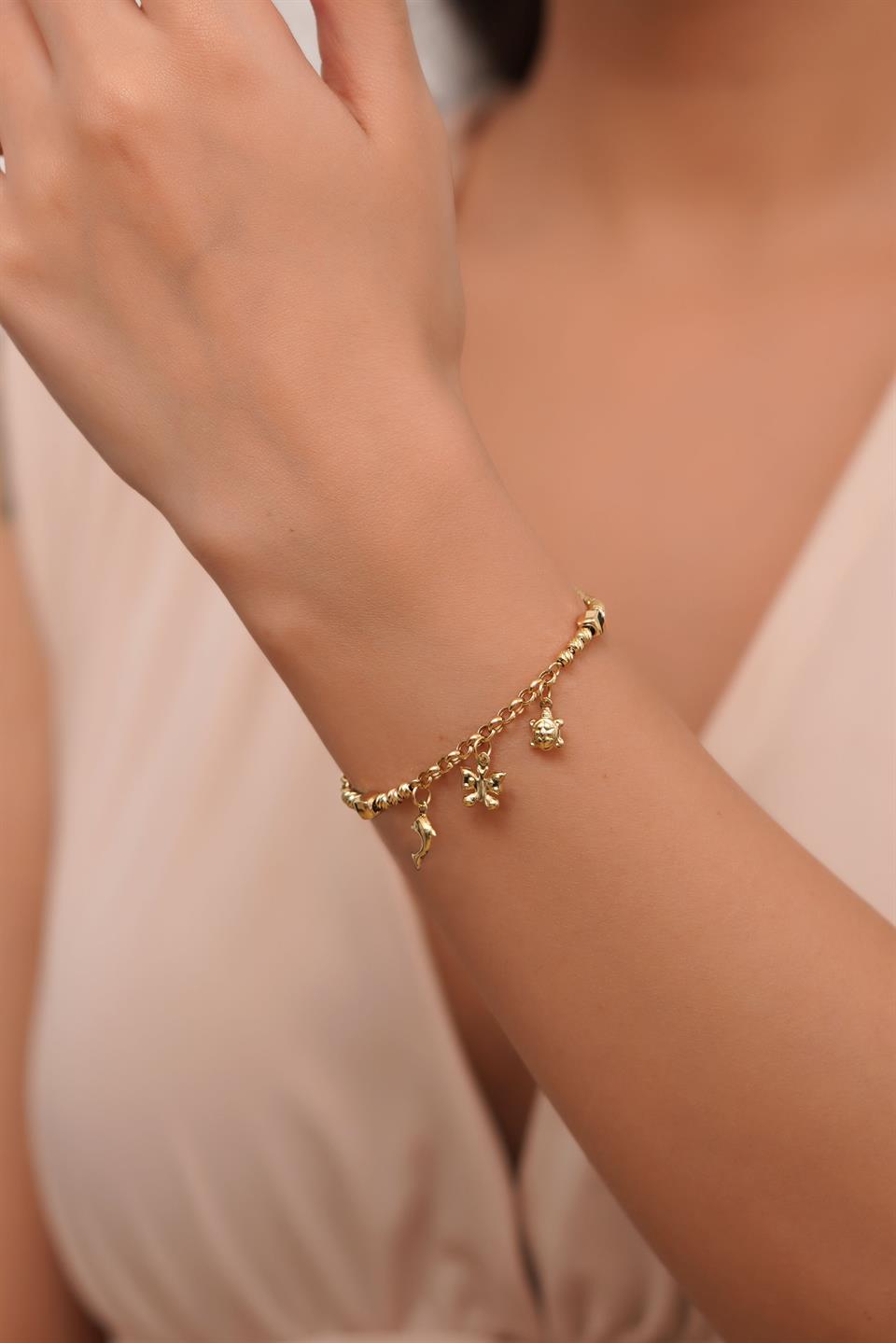 Pulsera con dijes de cuentas Dorica de oro macizo