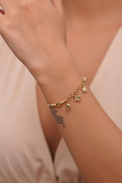 Pulsera con dijes de cuentas Dorica de oro macizo