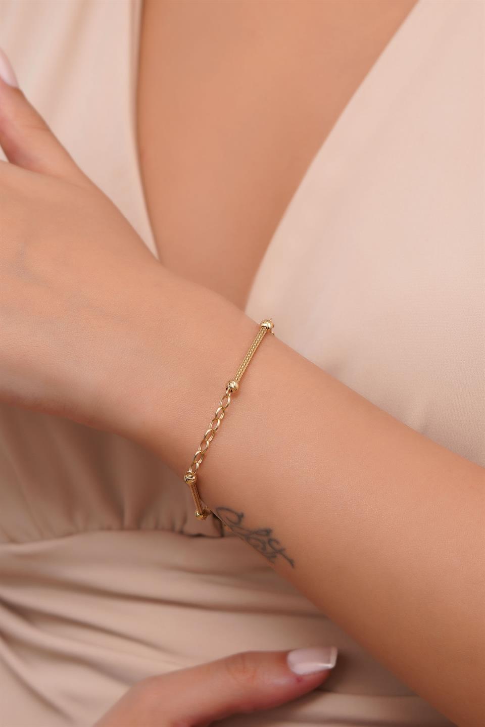 Pulsera de palo con cuentas Dorica de oro macizo