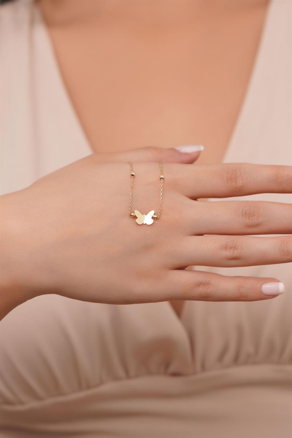 Pulsera de mariposa con cuentas Dorica de oro macizo