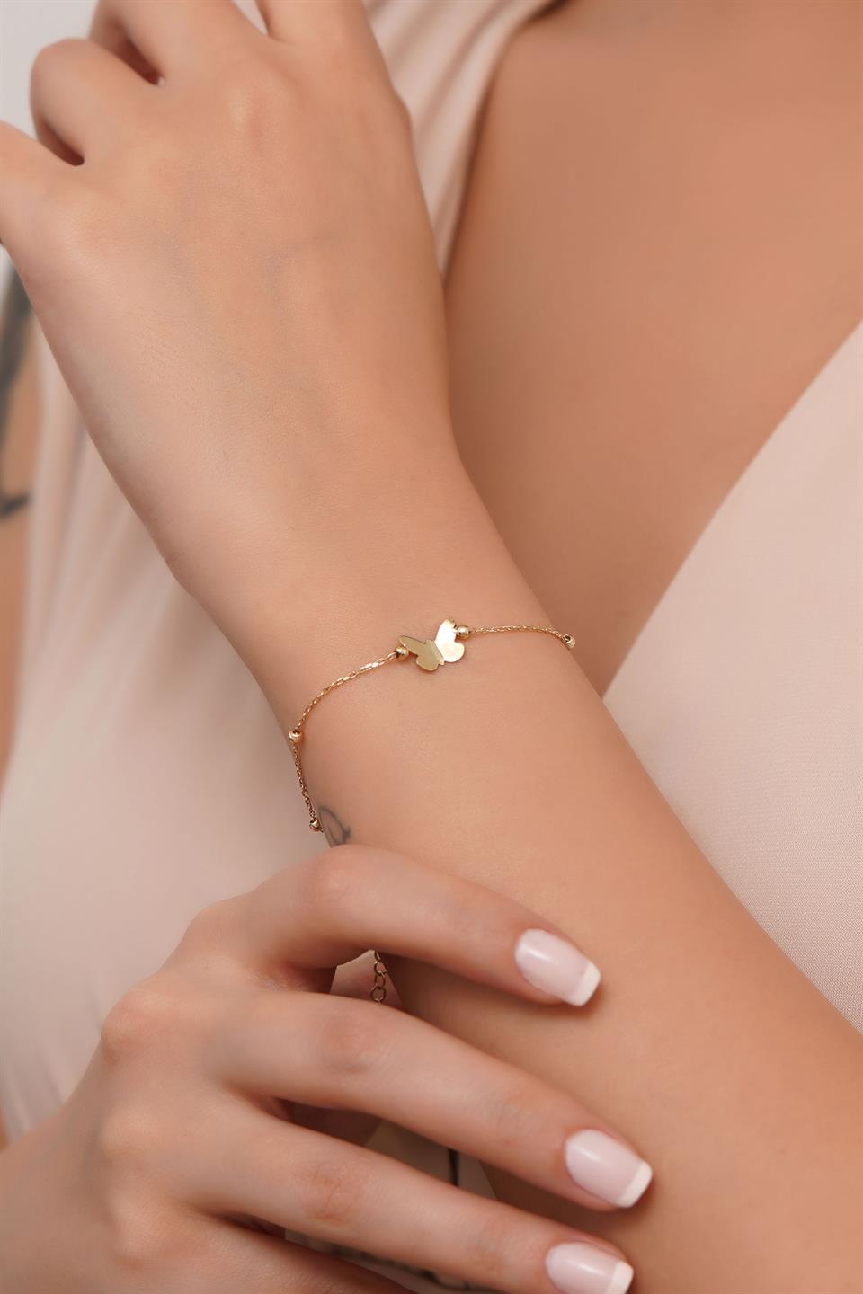 Pulsera de mariposa con cuentas Dorica de oro macizo