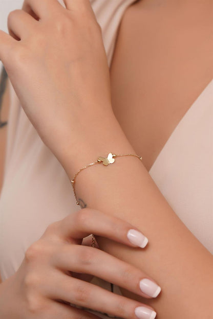 Pulsera de mariposa con cuentas Dorica de oro macizo