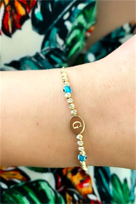 Pulsera de oro macizo con inicial de mal de ojo y cuentas de Dorica | 14K (585) | 2,34 gramos