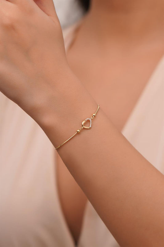 Pulsera de corazón de piedras preciosas de oro macizo