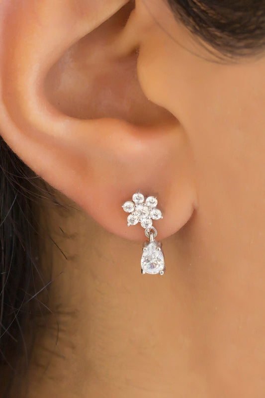 Boucles d'oreilles pendantes fleur en argent