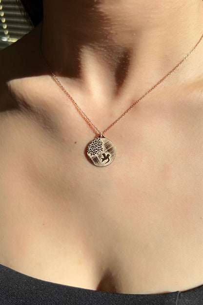 Collier médaillon oiseau en argent