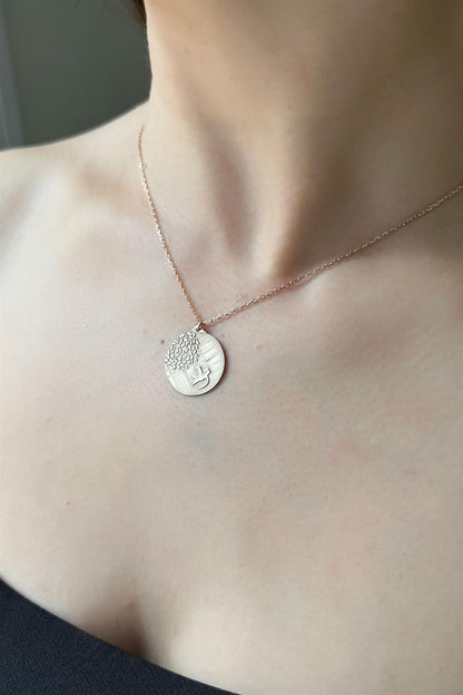 Collier médaillon oiseau en argent