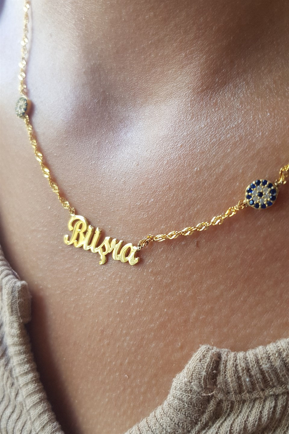 Collar con nombre de mal de ojo de plata