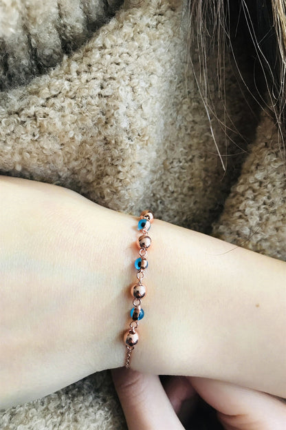 Pulsera de bolas de mal de ojo de plata