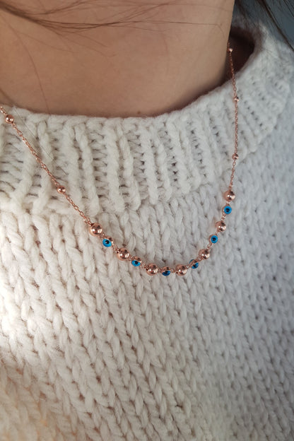 Collier boule en argent contre le mauvais œil