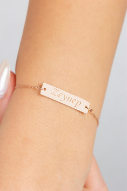 Pulsera con nombre y placa de plata